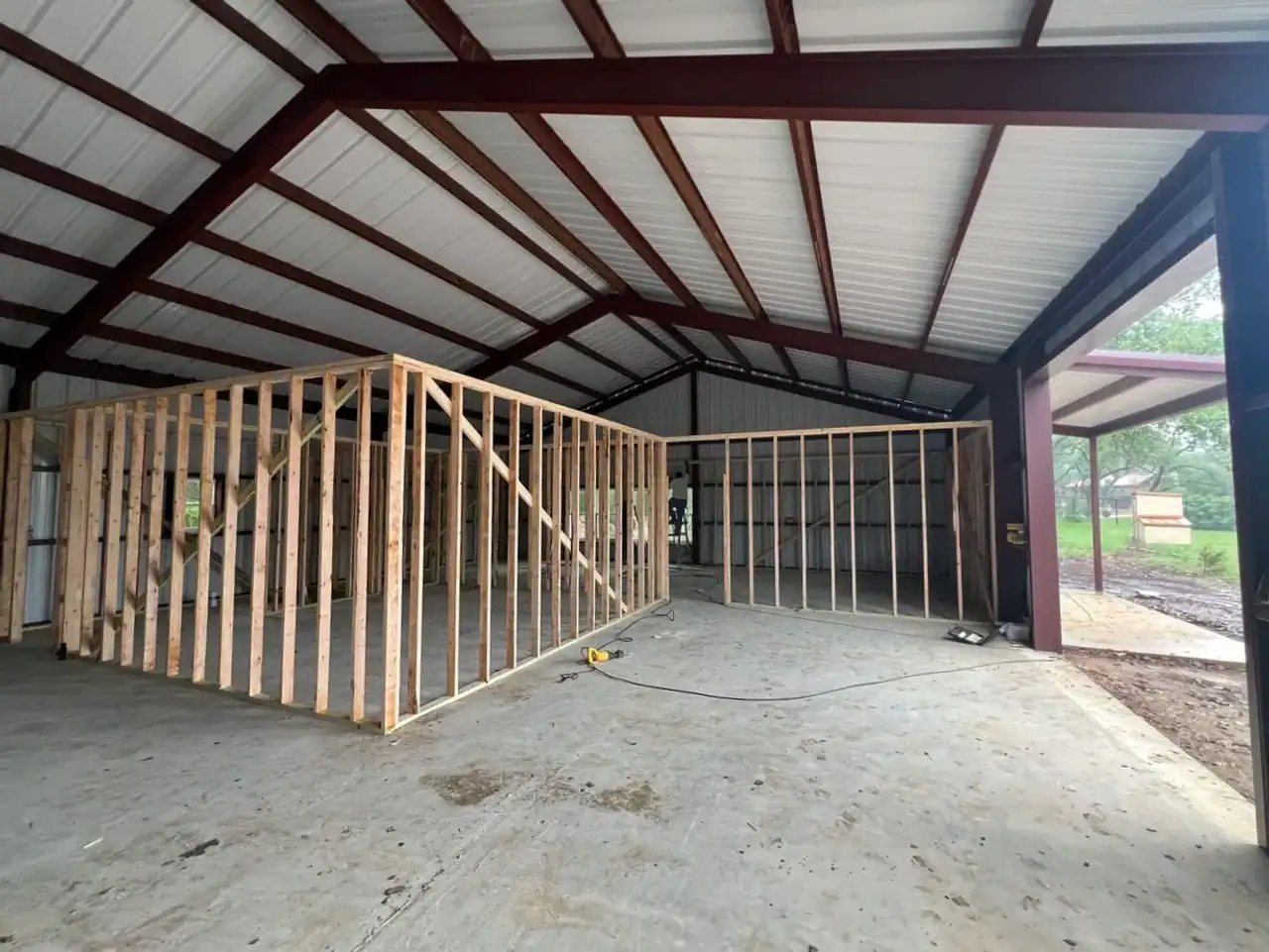 Interior rooms framed inside a steel barndominium shell in San Marcos