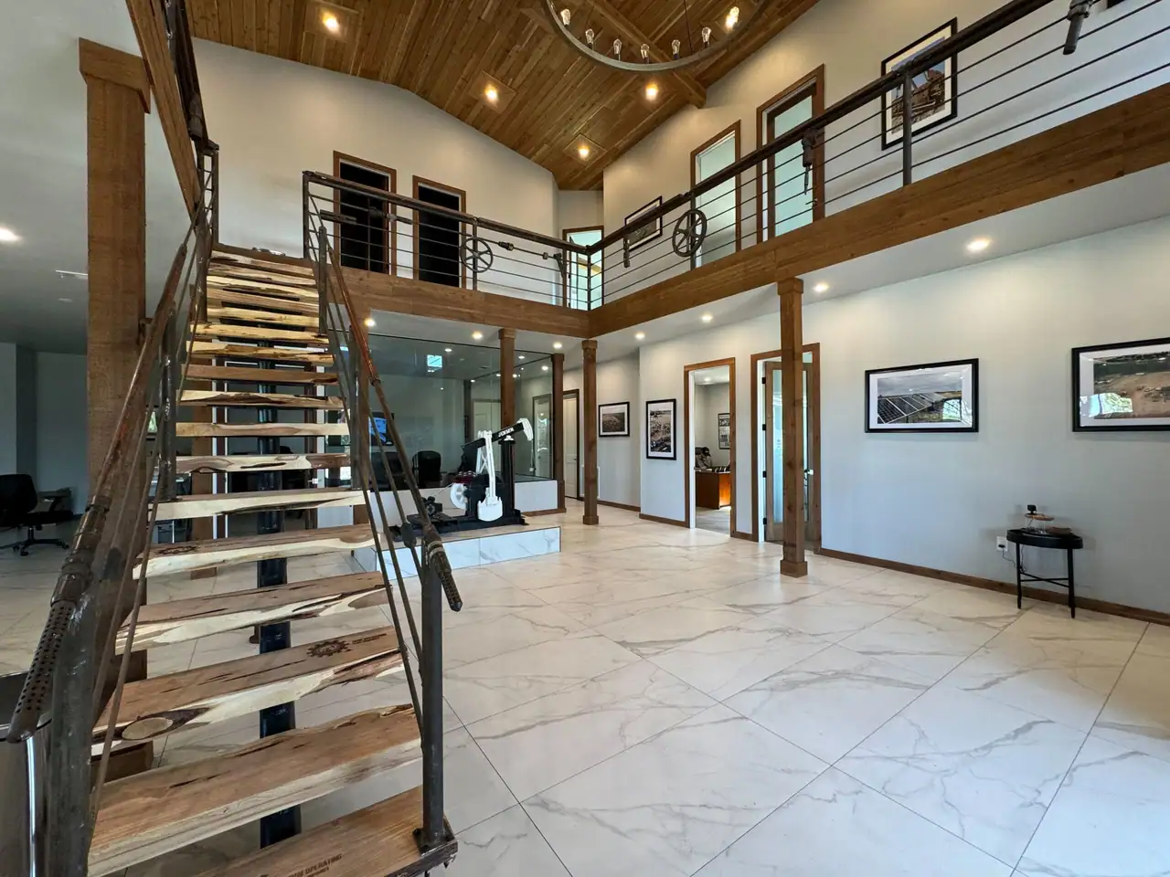 Finished Hill Country barndominium interior with a tall wood ceiling
