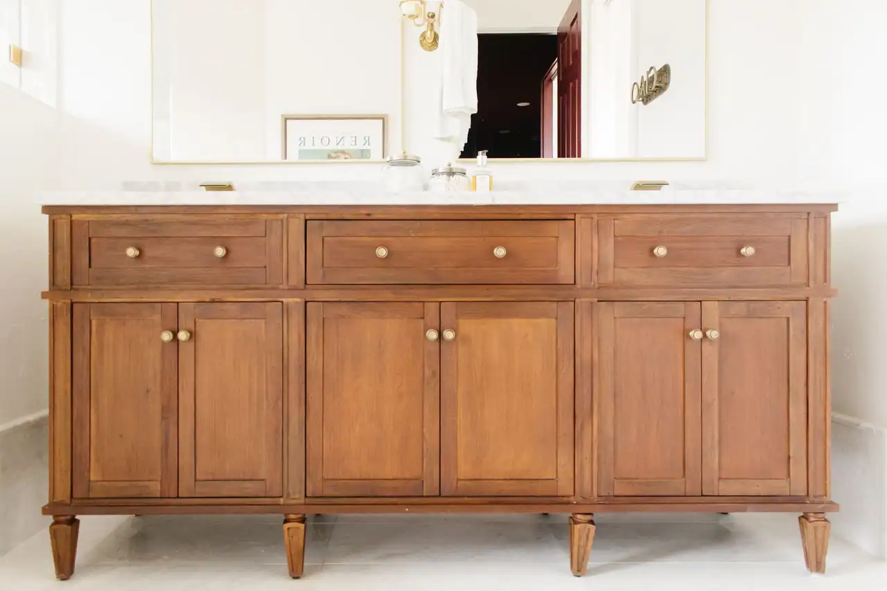 Custom wood double vanity with brass pulls