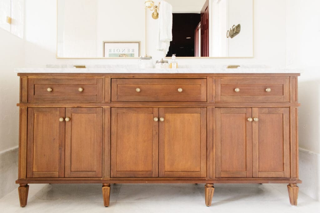 Custom wood double vanity with brass pulls