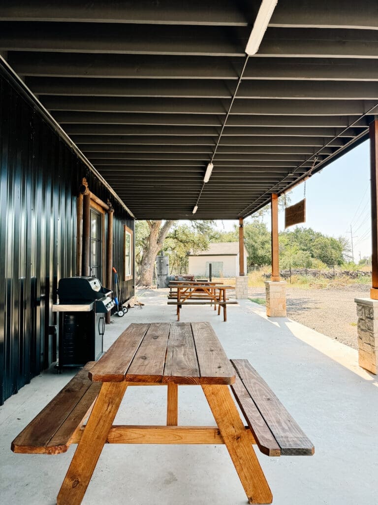 Covered breezeway of a custom livestock barn