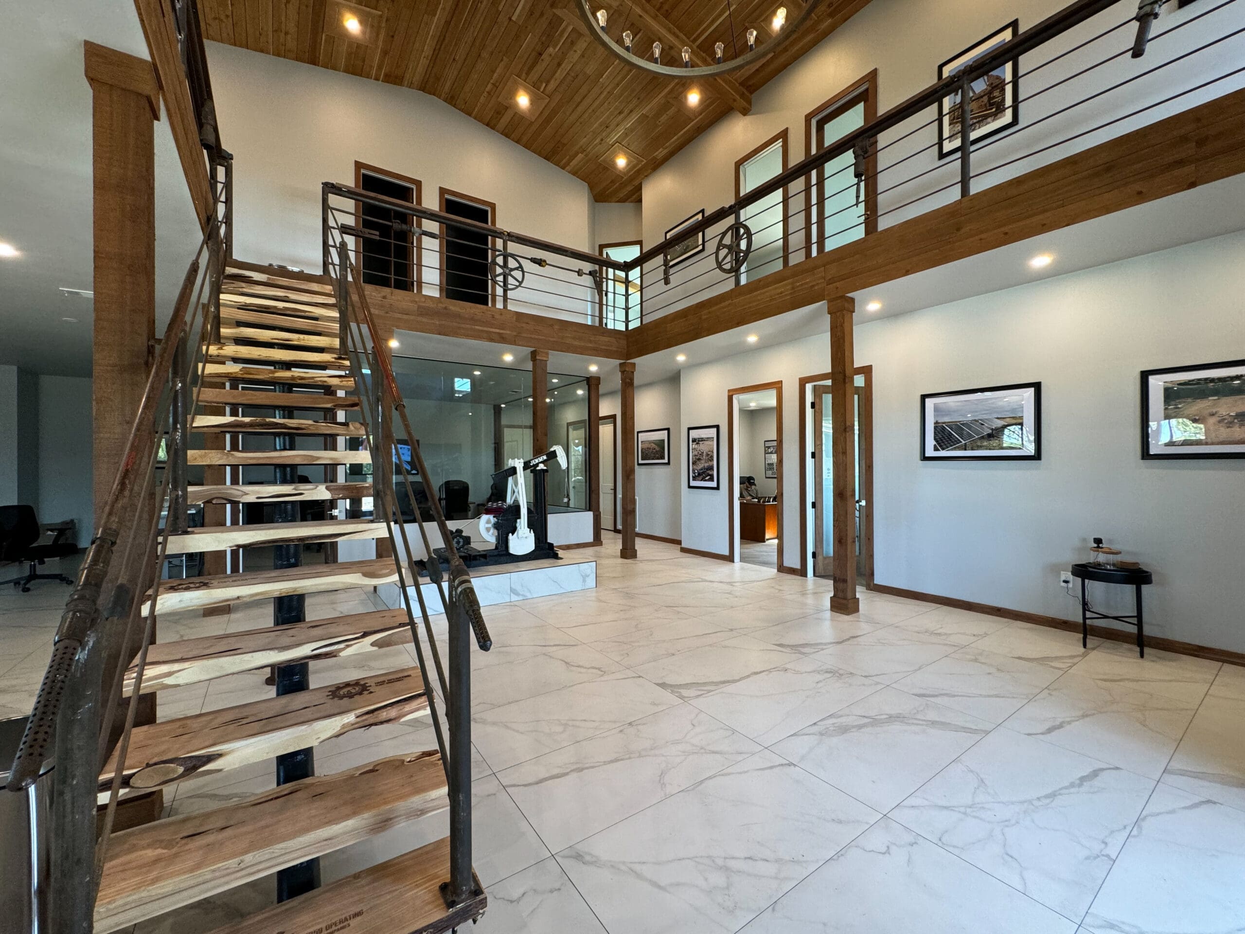 Modern barndominium office interior with open staircase